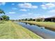 Picturesque water view from this neighborhood property showcasing a beautiful pond and surrounding homes at 5646 Sunset Falls Dr, Apollo Beach, FL 33572