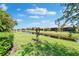 Beautiful water view of the neighborhood pond on a sunny day at 5646 Sunset Falls Dr, Apollo Beach, FL 33572