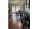 Open-concept layout showcases the dining area adjacent to the kitchen and screened patio at 603 Southwood Cv, Brandon, FL 33511