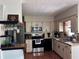 Functional kitchen with appliances, neutral-toned cabinets, and ample counter space at 603 Southwood Cv, Brandon, FL 33511