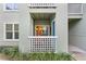 View of cozy balcony with a sliding door to a kitchen area, offering indoor-outdoor living at 607 S Albany Ave # 1, Tampa, FL 33606