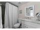 Bathroom featuring granite vanity, white cabinets, and a shower with a bathtub at 607 S Albany Ave # 1, Tampa, FL 33606