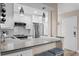 Updated kitchen boasts stainless steel appliances, granite counters, and modern lighting at 607 S Albany Ave # 1, Tampa, FL 33606