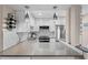 Bright kitchen features modern appliances, white cabinets and subway tile backsplash at 607 S Albany Ave # 1, Tampa, FL 33606