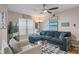 Inviting living room featuring a comfortable sectional sofa, stylish decor, and lots of natural light at 607 S Albany Ave # 1, Tampa, FL 33606