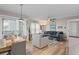 Inviting living room featuring a comfortable sectional sofa, stylish decor, and lots of natural light at 607 S Albany Ave # 1, Tampa, FL 33606