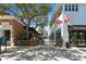 Picturesque shopping street with boutiques and stores, enhanced by mature trees for a pleasant pedestrian experience at 607 S Albany Ave # 1, Tampa, FL 33606