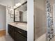 This bathroom has a lovely vanity and nautical decor at 6303 Gentle Ben Cir, Wesley Chapel, FL 33544