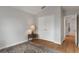 This bedroom is bright with a large closet and light wood floors at 6303 Gentle Ben Cir, Wesley Chapel, FL 33544