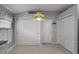 Bright kitchen area features ample storage with white cabinets and large closets at 6303 Gentle Ben Cir, Wesley Chapel, FL 33544