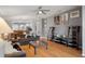 Bright and airy living room features wood floors and gray walls at 6303 Gentle Ben Cir, Wesley Chapel, FL 33544