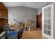Home office with hardwood floors, neutral walls, and natural light at 6303 Gentle Ben Cir, Wesley Chapel, FL 33544