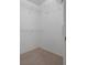 This walk-in closet offers ample storage space with wire shelving at 6303 Gentle Ben Cir, Wesley Chapel, FL 33544