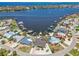Stunning aerial view of waterfront homes with private docks and boats on a sunny day at 6322 Cocoa Ln, Apollo Beach, FL 33572