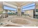 Bright bathroom with large soaking tub, mirrored walls and large windows for plenty of natural light at 6322 Cocoa Ln, Apollo Beach, FL 33572