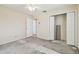 Bedroom view featuring an overhead fan, ample natural light, closet space, and potential for creative customization at 6322 Cocoa Ln, Apollo Beach, FL 33572