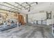 The spacious garage features ample storage shelves, utility sink, and lots of potential for organization or hobbies at 6322 Cocoa Ln, Apollo Beach, FL 33572
