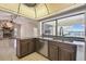 Kitchen area featuring stainless appliances, granite countertops and beautiful waterfront view at 6322 Cocoa Ln, Apollo Beach, FL 33572