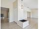 Open living area with tile floors, neutral paint, and entry closet at 6322 Cocoa Ln, Apollo Beach, FL 33572