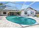 Relaxing screened-in pool area with ample space for outdoor seating at 6322 Cocoa Ln, Apollo Beach, FL 33572