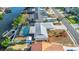 Aerial view features a screened pool, easy access to waterways, and low-maintenance landscaping at 6508 Senegal Palm Way, Apollo Beach, FL 33572