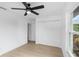 This bedroom includes a closet and window, offering storage and natural light at 6508 Senegal Palm Way, Apollo Beach, FL 33572