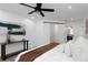 Bright bedroom featuring a comfortable bed and contemporary decor at 6508 Senegal Palm Way, Apollo Beach, FL 33572