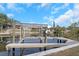 Boat lift on canal behind home at 6508 Senegal Palm Way, Apollo Beach, FL 33572