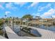 Boat lift on canal behind home at 6508 Senegal Palm Way, Apollo Beach, FL 33572