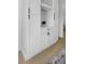 Elegant custom built-in cabinet with wine rack and marble countertop at 6508 Senegal Palm Way, Apollo Beach, FL 33572