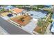 Landscaped front yard with decorative stone and brick-paved driveway that adds charm to this well-maintained home at 6508 Senegal Palm Way, Apollo Beach, FL 33572
