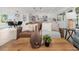 Open concept living space with kitchen, dining area, and comfortable seating arrangement at 6508 Senegal Palm Way, Apollo Beach, FL 33572