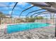 Relaxing enclosed pool area with brick pavers, perfect for outdoor enjoyment at 6508 Senegal Palm Way, Apollo Beach, FL 33572