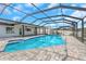 Inviting screened pool and patio area, ideal for outdoor leisure and entertaining at 6508 Senegal Palm Way, Apollo Beach, FL 33572