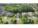 An aerial view of homes in a well-maintained community with lush green landscaping and multiple ponds at 6555 Sparkling Way, Wesley Chapel, FL 33545