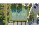 An aerial view of a nice full-sized basketball court with professional striping and nearby parking at 6555 Sparkling Way, Wesley Chapel, FL 33545