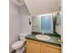 Powder room with neutral colored walls, a toilet, and vanity with sink at 727 Kensington Lake Cir, Brandon, FL 33511