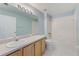 A bathroom with a white countertop and shower at 727 Kensington Lake Cir, Brandon, FL 33511