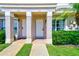 Inviting townhouse with two front doors, lovely landscaping and private entrance for each unit at 727 Kensington Lake Cir, Brandon, FL 33511