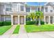 Inviting front entrance featuring lush landscaping and a well-maintained walkway to the front door at 727 Kensington Lake Cir, Brandon, FL 33511