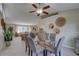 Bright dining room with neutral walls, carpet, with views to the living room for an inviting atmosphere at 7600 Drew Oak Dr, Seminole, FL 33772