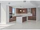 Modern kitchen featuring designer cabinets, stainless appliances, and a large island at 777 3Rd N Ave # 905, St Petersburg, FL 33701