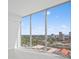 Bright living room showcasing floor-to-ceiling windows and beautiful city views at 777 3Rd N Ave # 905, St Petersburg, FL 33701