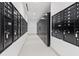 Hallway with rows of black mailboxes for residents, enhancing convenience and security at 777 3Rd N Ave # 905, St Petersburg, FL 33701