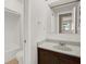 Bathroom featuring a vanity and a walk-in shower at 8630 Cattail Dr # 8630, Temple Terrace, FL 33637