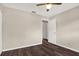 Bedroom with ceiling fan and dark wood flooring at 8630 Cattail Dr # 8630, Temple Terrace, FL 33637