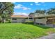 Charming single-story home with well-maintained lawn and covered parking at 8630 Cattail Dr # 8630, Temple Terrace, FL 33637