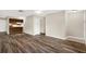 Open-concept living room with stylish flooring and neutral paint at 8630 Cattail Dr # 8630, Temple Terrace, FL 33637