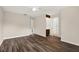 Spacious main bedroom with wood-look floors, ceiling fan and access to bathroom and closet at 8630 Cattail Dr # 8630, Temple Terrace, FL 33637
