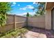 The patio has a privacy fence and brick flooring at 8630 Cattail Dr # 8630, Temple Terrace, FL 33637